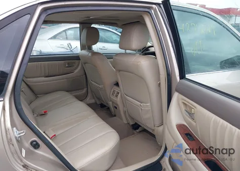 2003 Toyota Avalon Xls z USA, uszkodzony, nr VIN 4T1BF28B83U304145